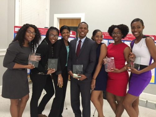 Tougaloo College students pose with awards from the annual Disaster and Coastal Studies Symposium, which features student presentations and guest lectures.